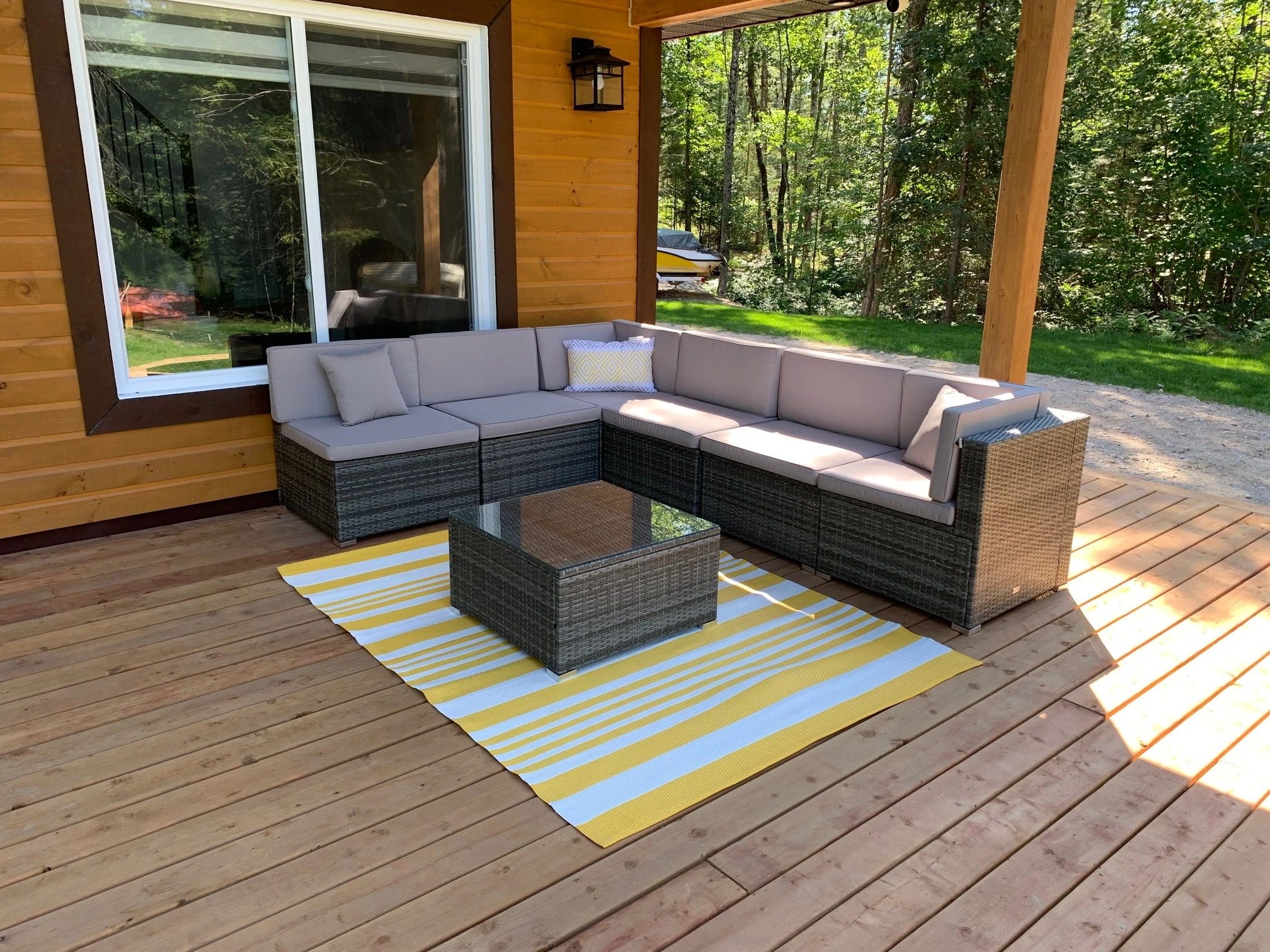 Outdoor patio with sectional sofa on the deck