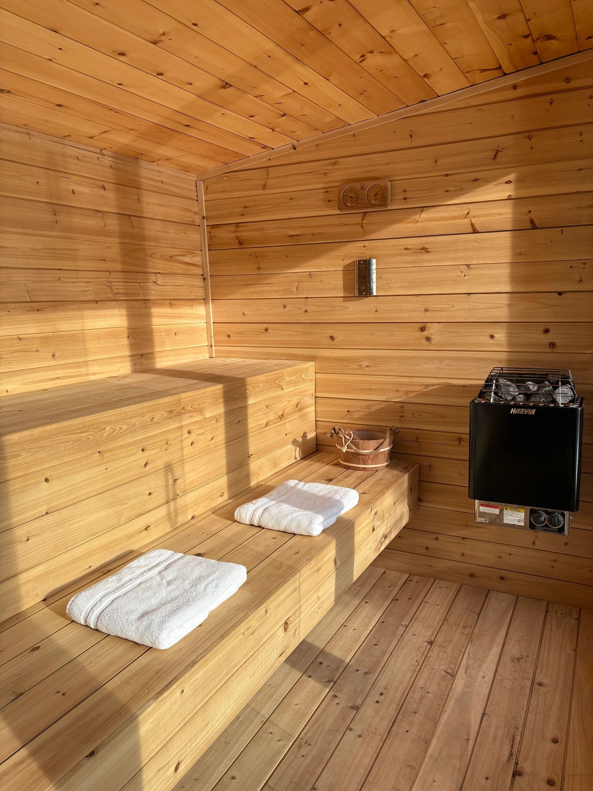 Cedar sauna interior with tiered benches